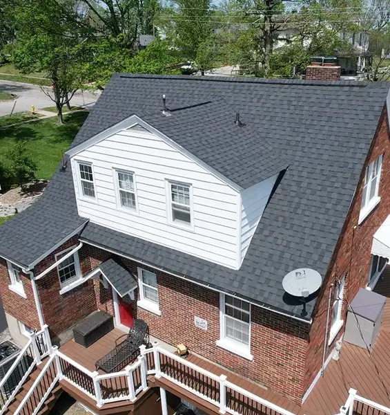 Chester IL home that replaced outdate roof with new Moire Black CertainTeed Shingle roof